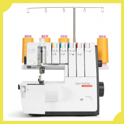 Bernette B48 Funlock Serger and Coverstitch Machine Bundle with Rotary Cutter, Scissors, Threads, and Cutting Mat